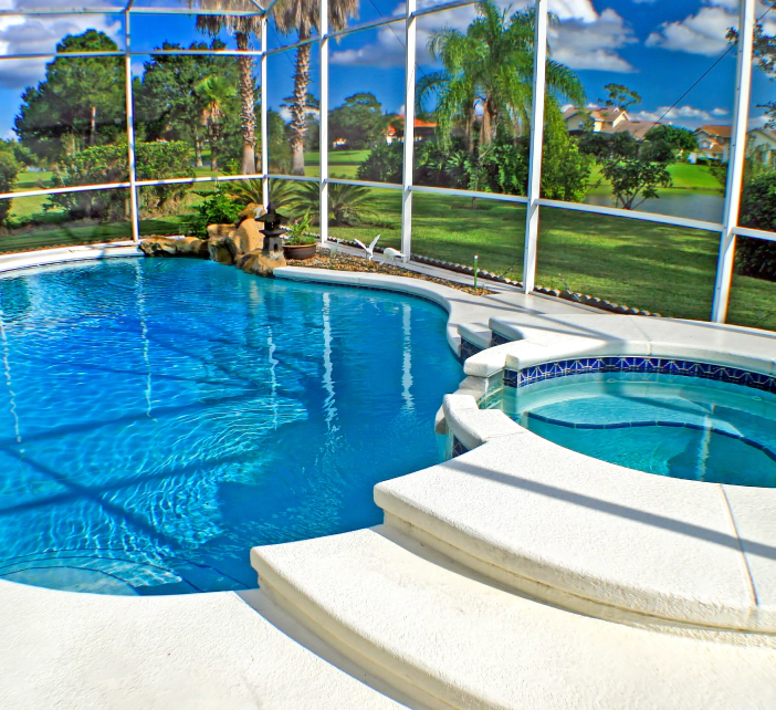 closed pool area with small hot tub